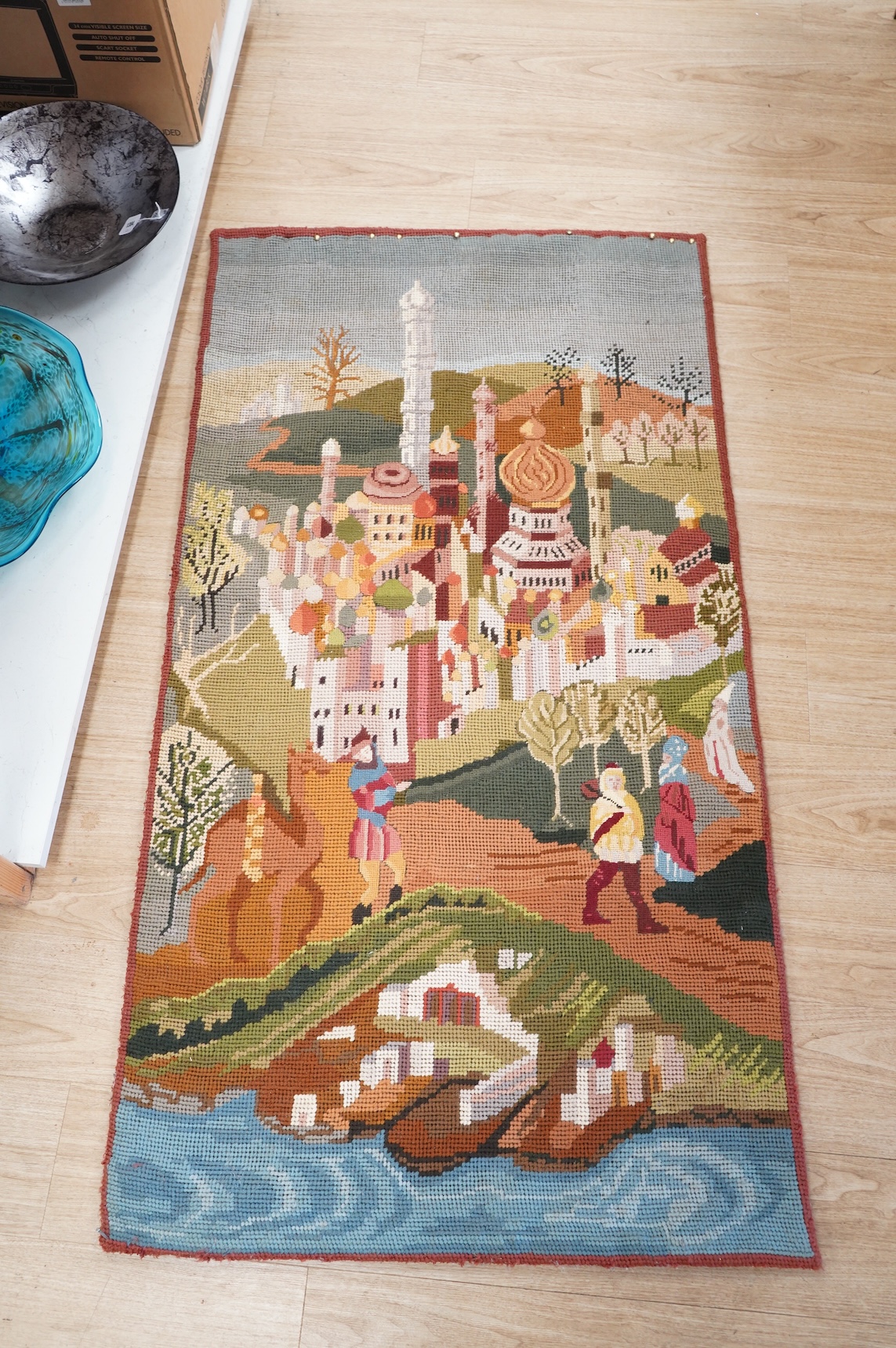 A group of three large modern wool work unframed panels together with two similar framed panels, largest framed panel 138cm x 86cm